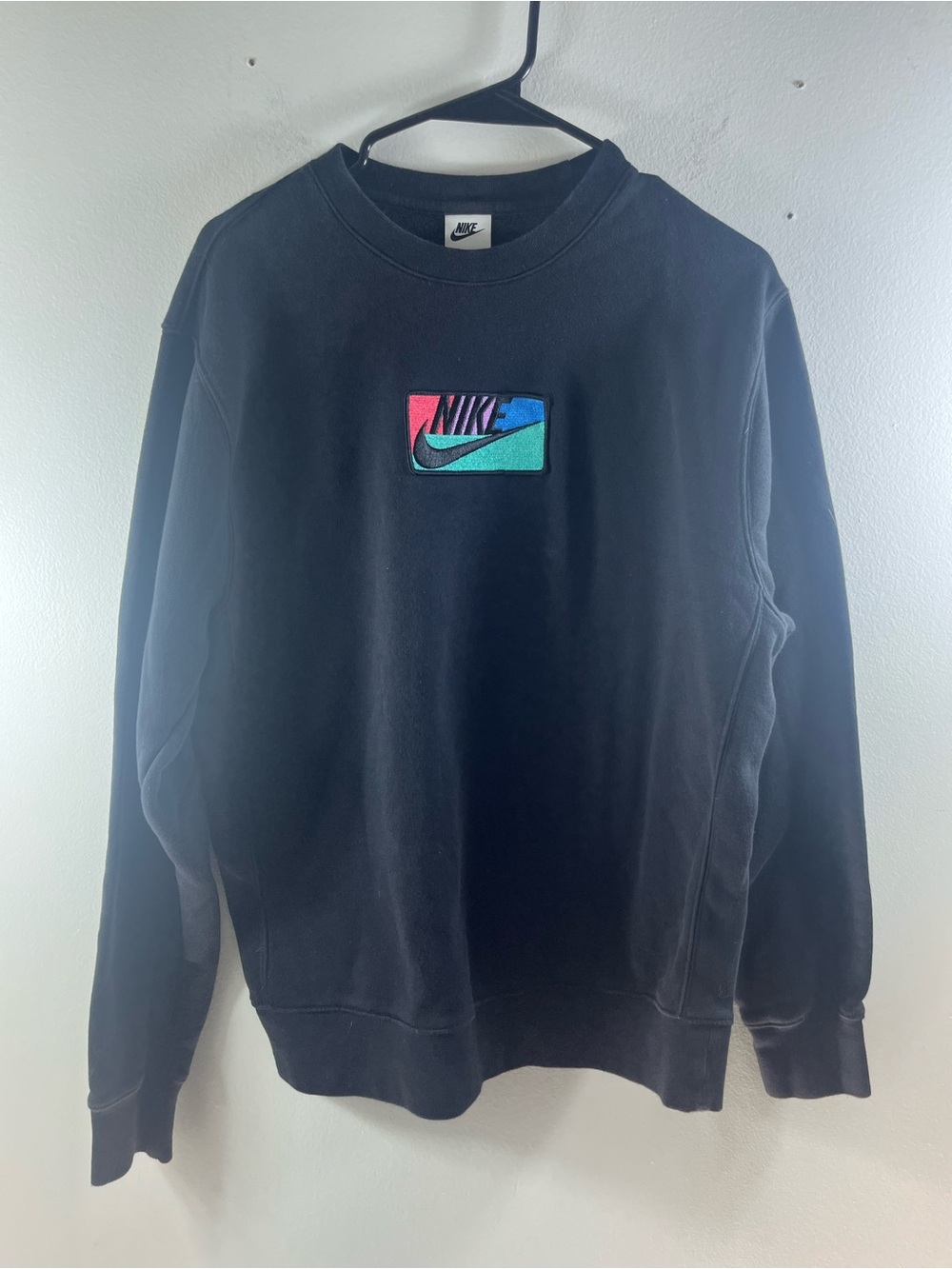 Nike Black Crewneck with Teal Pink and Blue Logo Patch